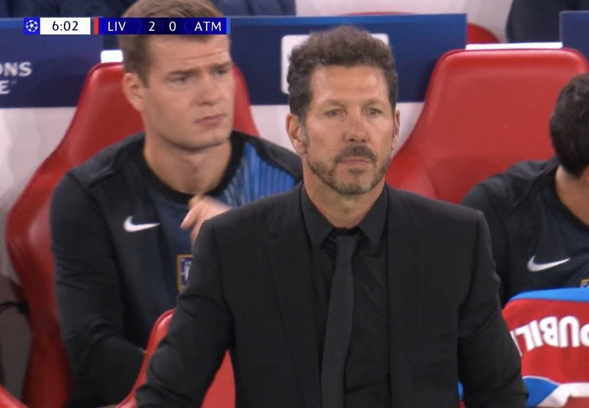 A group of men sitting in a stadium

AI-generated content may be incorrect.