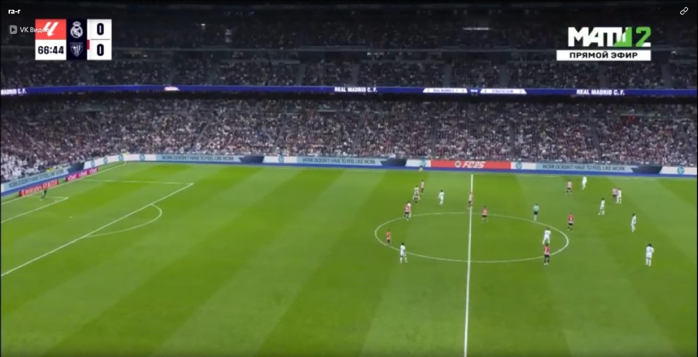 A football field with people in the stands

AI-generated content may be incorrect.
